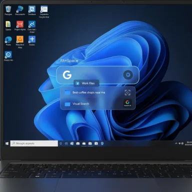 Laptop screen shows a Windows 11–style search overlay over a blue abstract wallpaper.