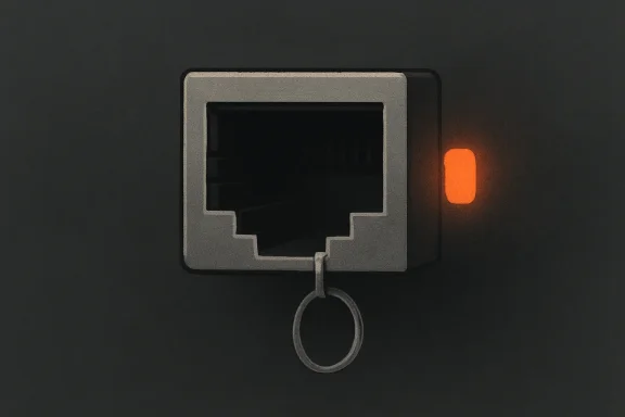 Metallic security control panel with a glowing orange indicator and dangling key ring.