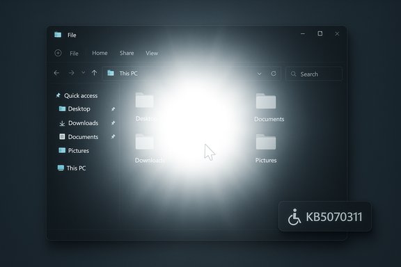 Windows File Explorer window with a bright center glow and an accessibility badge KB5070311.