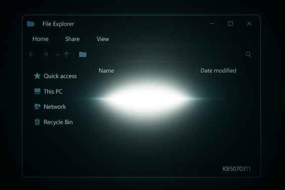 A dark Windows File Explorer window with a bright central glow and a KB5070311 label.